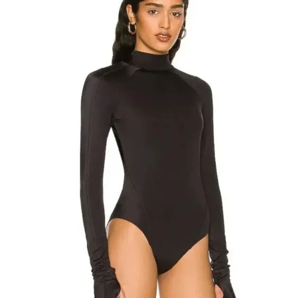 New. We Are HAH black 1-piece swim/bodysuit. Retails $240. Medium